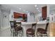 Bright kitchen featuring stainless steel appliances, warm-toned cabinetry, and a breakfast bar with seating at 1567 Fayrene Rd, Rock Hill, SC 29732