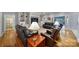 Spacious living room boasts hardwood floors, built-in shelves, and comfortable seating arrangement at 1567 Fayrene Rd, Rock Hill, SC 29732
