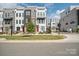 Modern townhouse exterior with red front door and street view at 1925 Dunavant St, Charlotte, NC 28203