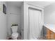 Cozy bathroom featuring a toilet with plants and a shower with a curtain at 211 Heritage Blvd # 502, Fort Mill, SC 29715
