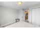 Bedroom with a white bed, closet, and neutral walls, for a bright, clean feel at 211 Heritage Blvd # 502, Fort Mill, SC 29715