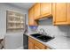 Modern kitchen with a stainless steel sink, ample cabinet space, and countertop appliances at 211 Heritage Blvd # 502, Fort Mill, SC 29715