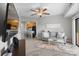 Stylish living room features a view into the kitchen with bar seating, wood floors, and cozy seating at 211 Heritage Blvd # 502, Fort Mill, SC 29715