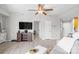 Open living room with modern décor, ceiling fan, and plenty of natural light at 211 Heritage Blvd # 502, Fort Mill, SC 29715