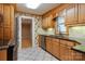 Bright kitchen featuring wooden cabinets, granite countertops, and stainless steel appliances at 114 34Th Nw St, Hickory, NC 28601