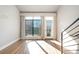 Bright living room with large windows and city views at 115 E Park Ave # 419, Charlotte, NC 28203