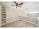 Bright loft bedroom with built-in shelving at 115 E Park Ave # 419, Charlotte, NC 28203