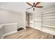 Loft bedroom with large closet and shelving at 115 E Park Ave # 419, Charlotte, NC 28203