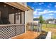 View of a screened back patio featuring a grill, outdoor lights, and a fenced yard at 500 Pearl Place Ln, York, SC 29745