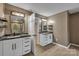 Bathroom with double vanities, granite countertops, and modern lighting fixtures at 500 Pearl Place Ln, York, SC 29745