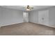 Bedroom with carpeting, closet doors and an entryway at 500 Pearl Place Ln, York, SC 29745
