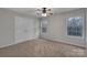 Neutral bedroom featuring carpet and a double door closet at 500 Pearl Place Ln, York, SC 29745