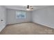 Bedroom with ceiling fan and a window providing natural light at 500 Pearl Place Ln, York, SC 29745