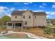 Exterior view of a two-story home with a screened-in porch and an inviting swimming pool at 500 Pearl Place Ln, York, SC 29745