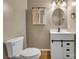 Stylish half-bathroom featuring a modern vanity, barn door cabinet, and updated fixtures at 500 Pearl Place Ln, York, SC 29745