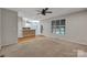 Open concept living room with access to the kitchen and a view of the pool at 500 Pearl Place Ln, York, SC 29745