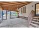 Inviting screened porch with wood ceiling, tile floors, and an open view to the surrounding yard at 500 Pearl Place Ln, York, SC 29745