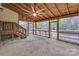 Spacious screened porch with wood ceiling and views of the backyard pool and surrounding greenery at 500 Pearl Place Ln, York, SC 29745