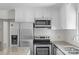 Kitchen featuring stainless steel appliances, granite countertops, and white cabinetry at 539 Rockwell Cir, Rock Hill, SC 29730