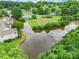 This home has it all with an in-ground pool, lake, and quiet neighborhood at 5832 Amity Springs Dr, Charlotte, NC 28212