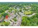 Aerial view of the neighborhood with lush trees and a great view of the homes at 5832 Amity Springs Dr, Charlotte, NC 28212
