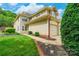 Charming two-story home with attached garage, landscaped yard, and inviting curb appeal at 5832 Amity Springs Dr, Charlotte, NC 28212
