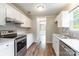 Well-equipped kitchen with stainless steel appliances and modern cabinets at 5832 Amity Springs Dr, Charlotte, NC 28212