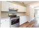 This is a newly remodeled kitchen with stainless steel appliances and modern cabinetry at 5832 Amity Springs Dr, Charlotte, NC 28212