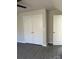 Bright bedroom features spacious closet with white doors and silver hardware at 1506 7Th St, Statesville, NC 28677