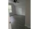 Bright, open bedroom with a ceiling fan and neutral walls at 1506 7Th St, Statesville, NC 28677