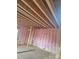 Unfinished room with visible framing and insulation at 1506 7Th St, Statesville, NC 28677