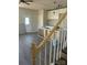 Modern kitchen with white cabinets being installed and gray flooring at 1506 7Th St, Statesville, NC 28677