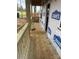 Spacious porch featuring wooden decking and railings under construction at 1506 7Th St, Statesville, NC 28677