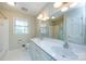 Well-lit bathroom with double sinks and a large mirror create a practical space at 5444 Marengo Cir, Charlotte, NC 28216