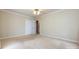 Neutral bedroom with white trim, closet, and doorway at 5444 Marengo Cir, Charlotte, NC 28216