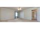 Cozy bedroom featuring a ceiling fan and a closet for ample storage at 5444 Marengo Cir, Charlotte, NC 28216