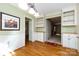 Open breakfast area with hardwood floors and views into adjacent living spaces at 5444 Marengo Cir, Charlotte, NC 28216