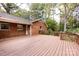 Large wooden deck on rear of brick home at 5444 Marengo Cir, Charlotte, NC 28216