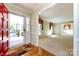 Inviting entryway showcasing hardwood floors and a glimpse into a spacious living room at 5444 Marengo Cir, Charlotte, NC 28216
