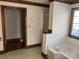 Bathroom featuring a bathtub, shower, and adjacent walk-in closet at 909 Woodhurst Dr, Monroe, NC 28110