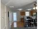 Bright kitchen with oak cabinets, white appliances, and eat-in bar at 1067 19Th Ne St # B, Hickory, NC 28601