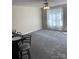 Cozy living room featuring a ceiling fan, carpet, and a window with natural light at 1067 19Th Ne St # B, Hickory, NC 28601