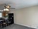 Open living area with a view into the kitchen and bar seating at 1067 19Th Ne St # B, Hickory, NC 28601