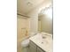 Bathroom featuring a tub with shower, toilet, vanity mirror and overhead light at 14301 Beryl Ct, Pineville, NC 28134