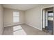 This bedroom has carpet flooring and a door at 14301 Beryl Ct, Pineville, NC 28134