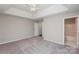 The spacious main bedroom offers ample natural light and neutral tones, creating a serene atmosphere at 14301 Beryl Ct, Pineville, NC 28134