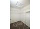 Organized walk-in closet with shelving for efficient storage at 14301 Beryl Ct, Pineville, NC 28134