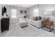 Comfortable living room with a neutral color palette, plush seating, and ample natural light at 442 Serenity Cir, Cramerton, NC 28032