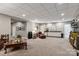 Spacious finished basement with entertainment area and wet bar for relaxation and hosting guests at 9723 Sedgefield Dr, Waxhaw, NC 28173