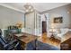 Charming office with a wooden desk, ample lighting, and a comfortable chair, ideal for a home workspace at 9723 Sedgefield Dr, Waxhaw, NC 28173